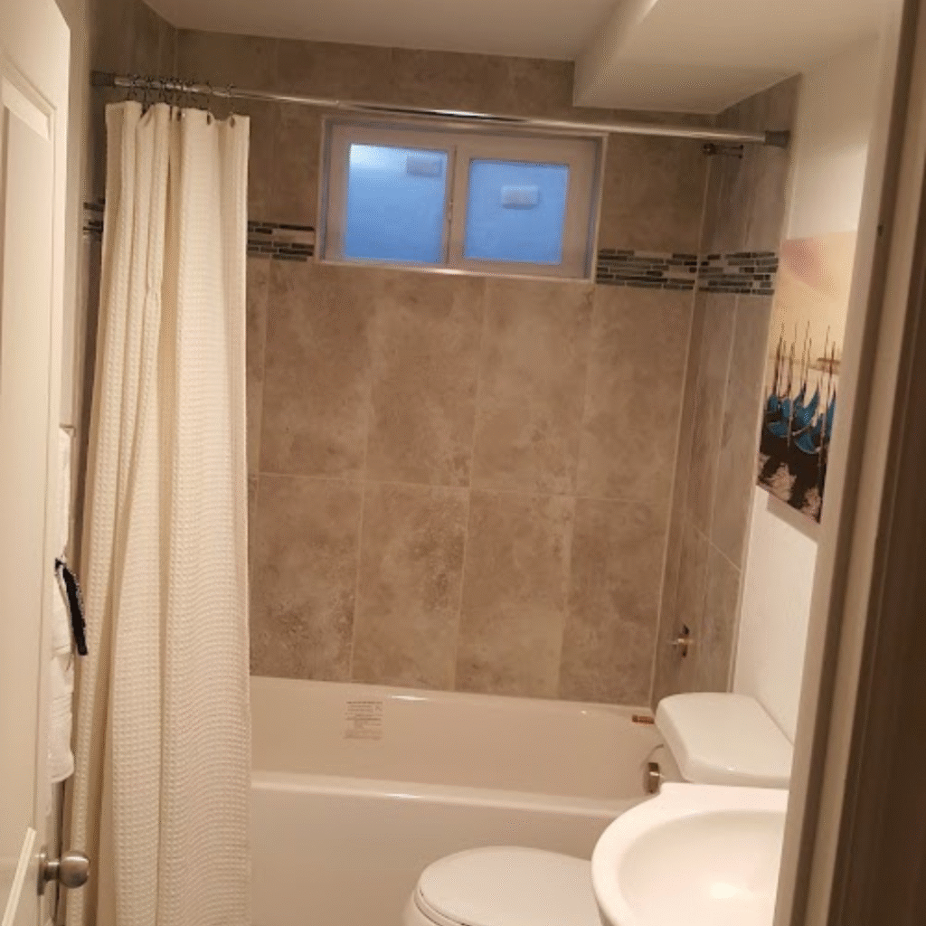 Full bathroom remodel with new tiles and fixtures in Denver