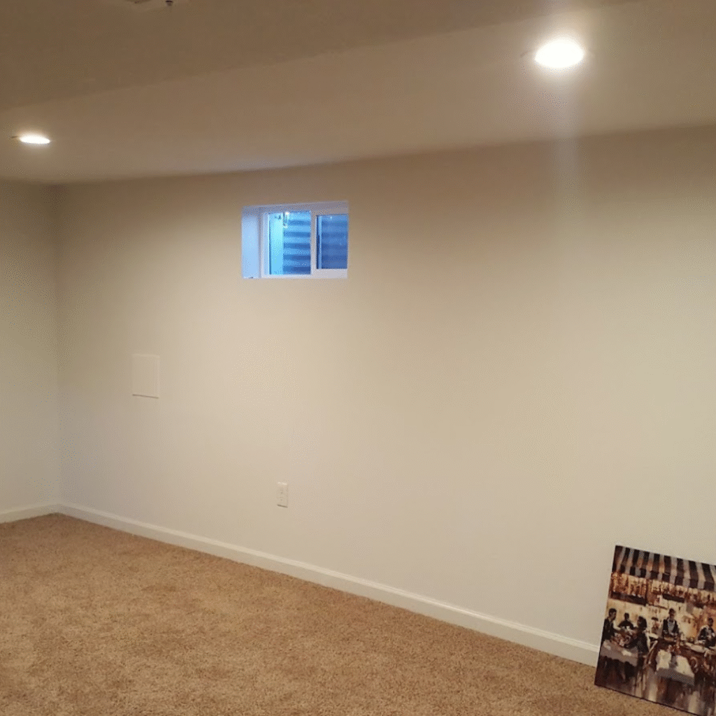 Basement wall finishing and painting project in Lakewood