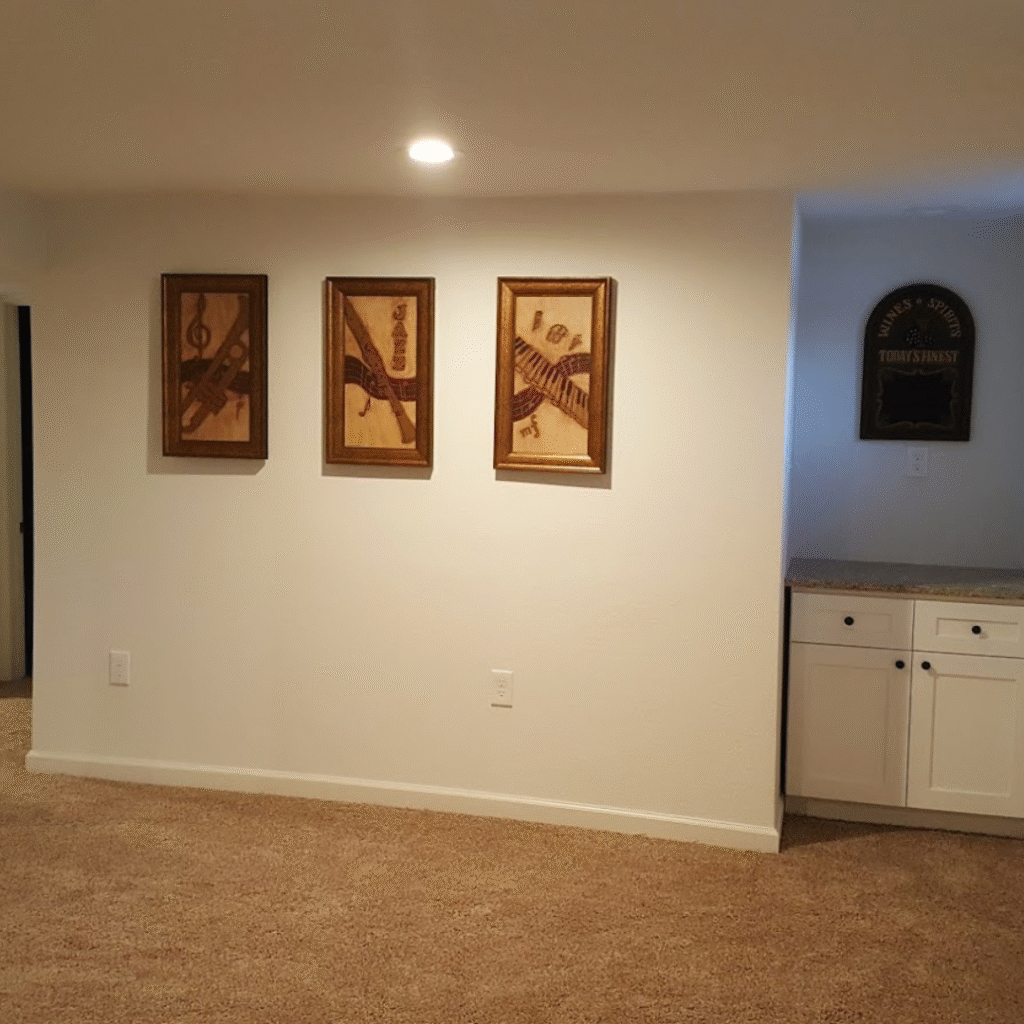 Living room renovation with new flooring and fresh paint in Lakewood